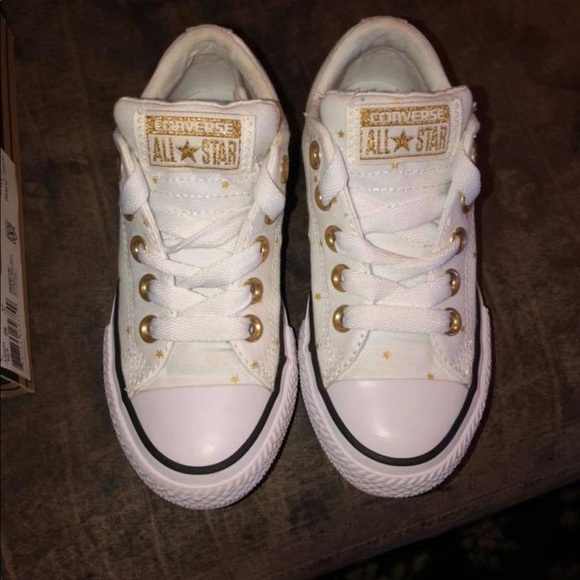 white converse with gold stars